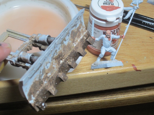 Start of muddying up the dozer blade. I used weathering products from AK Interactive.